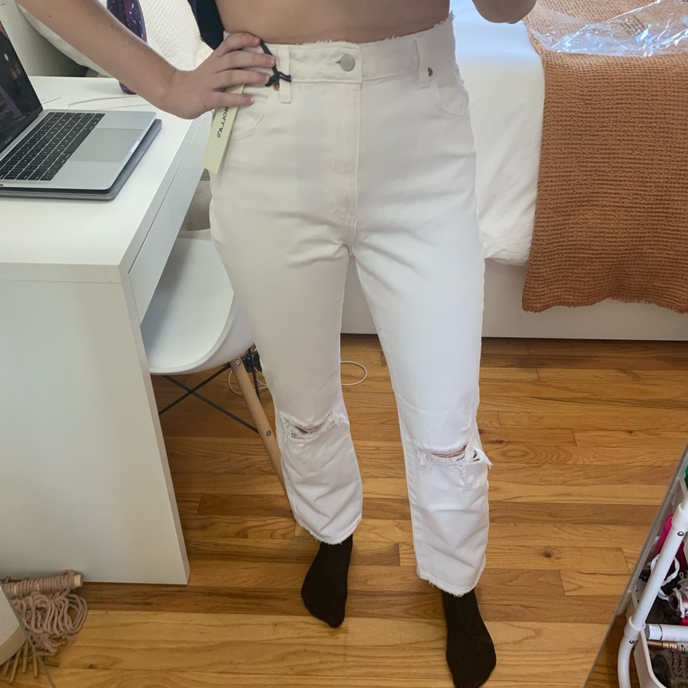 Straight leg ripped Rolla’s white jeans